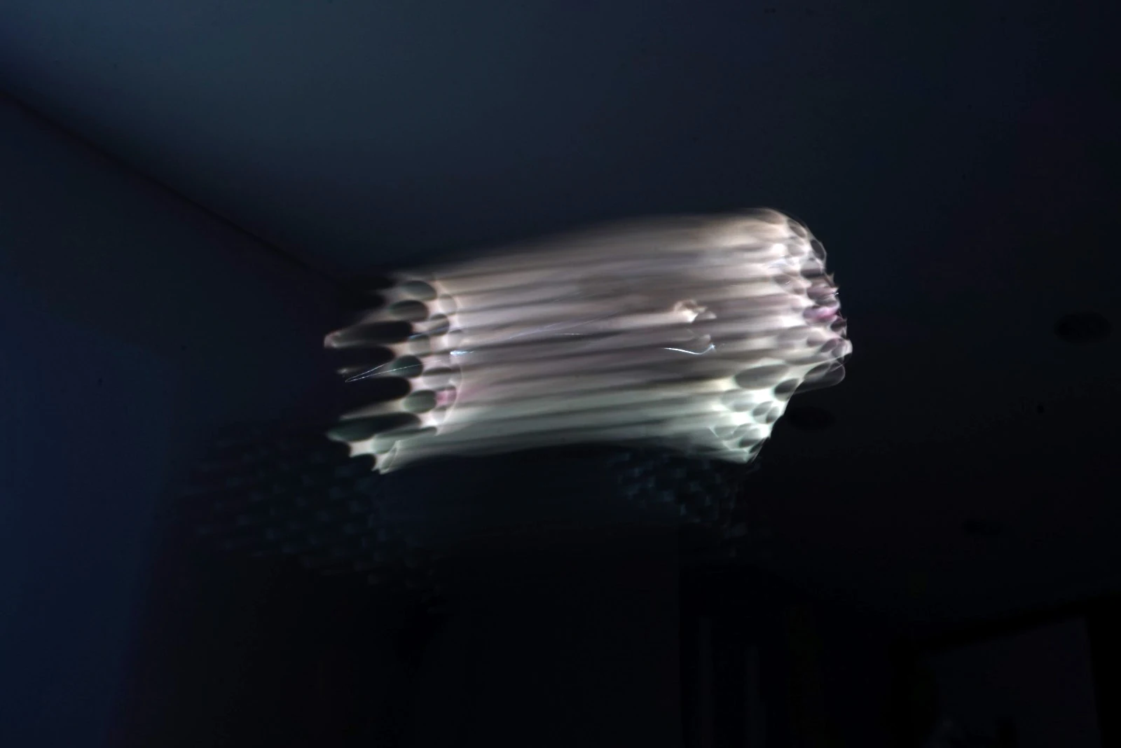 Face, 2020 — a face becomes a horizontal trace of white light