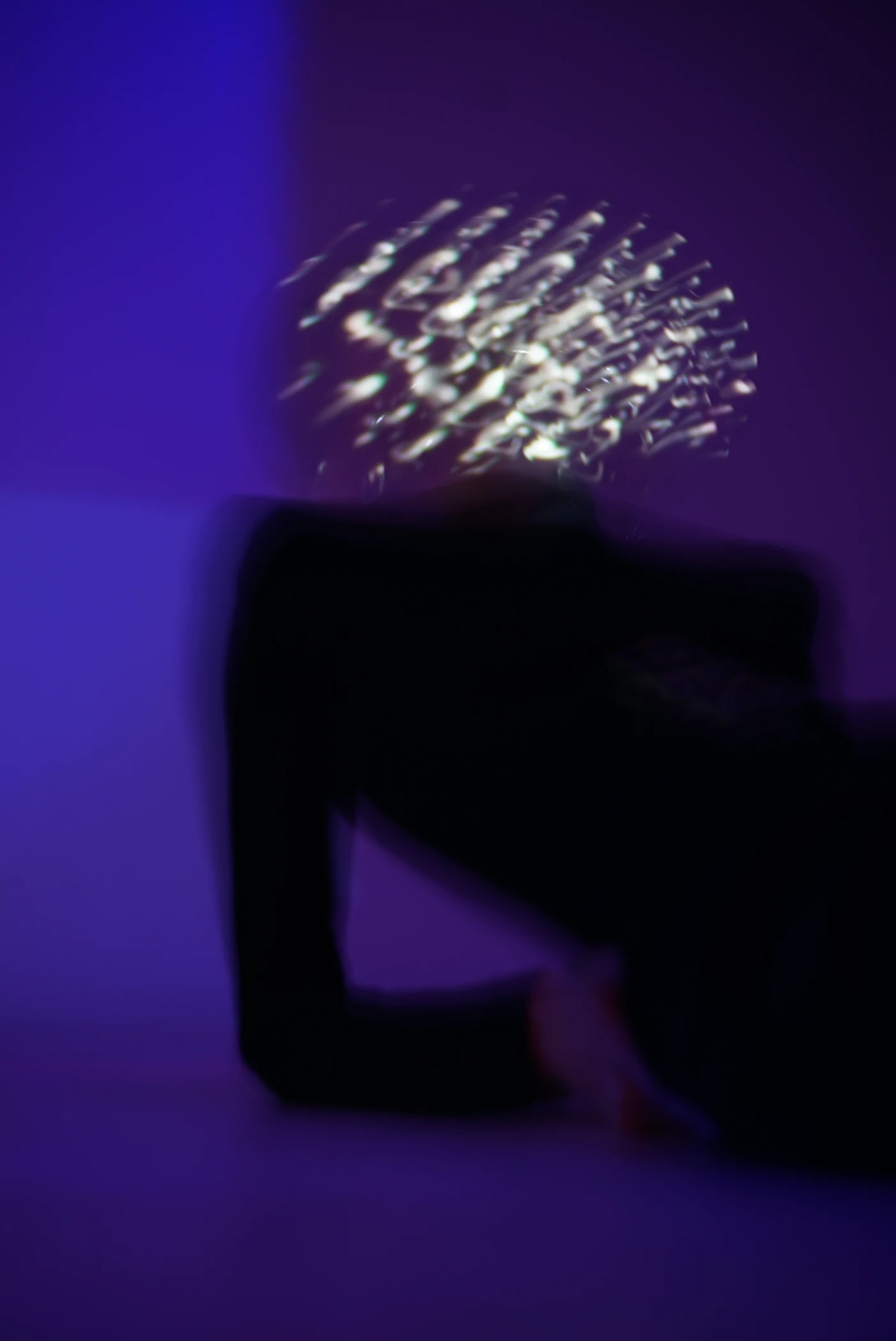 White light patterns across a figure in violet space
