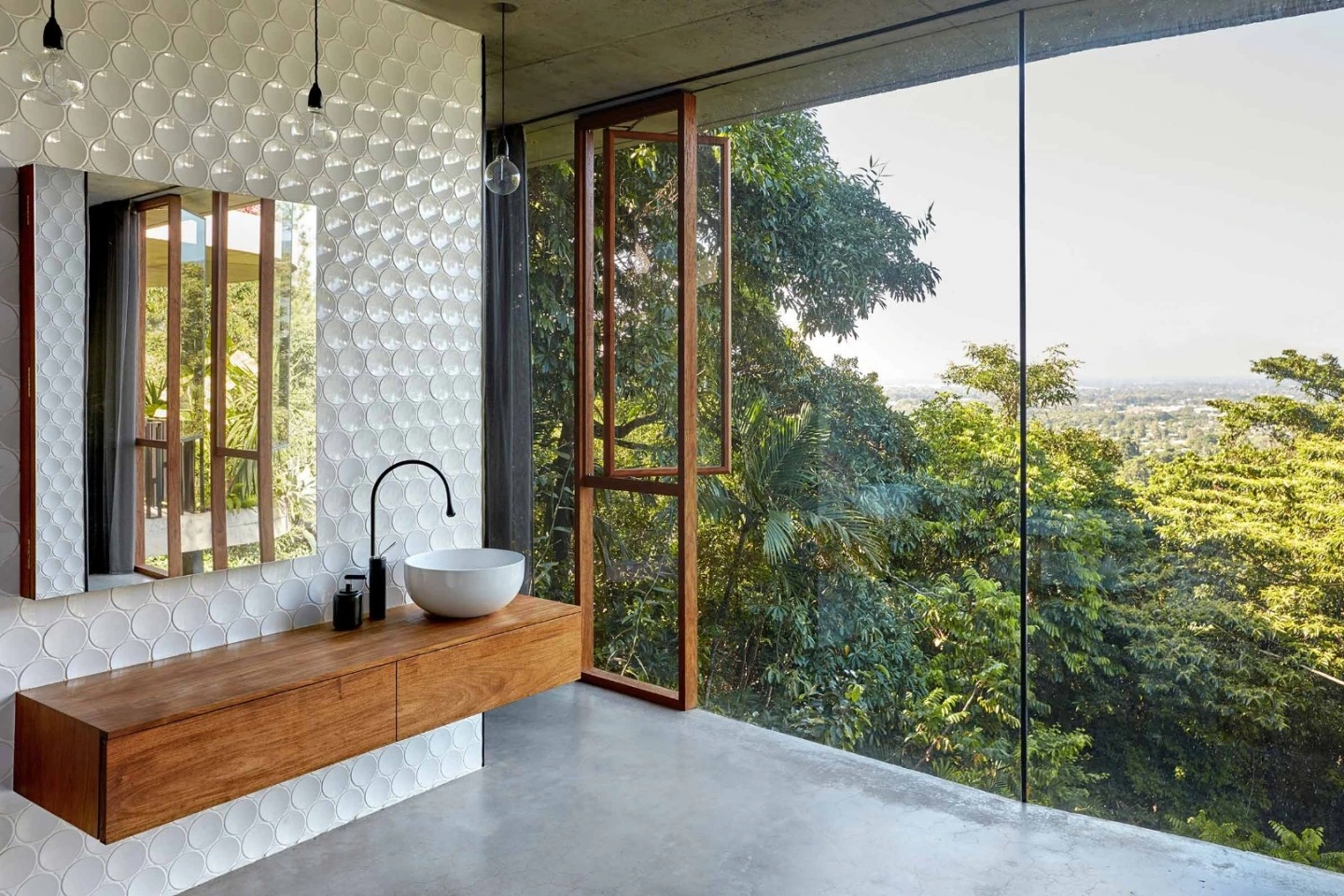 Wide view of the Dot bathroom and open corner windows