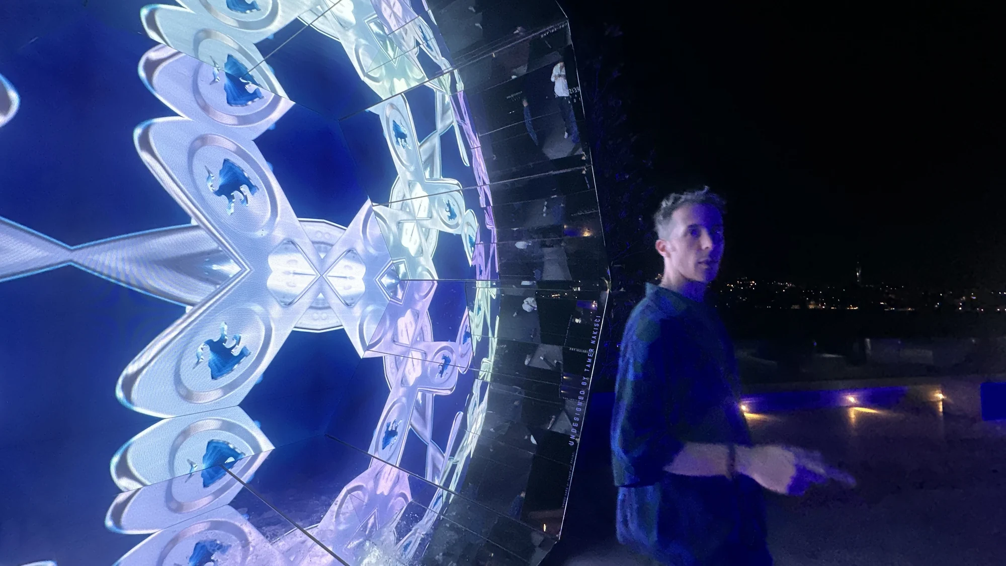 Visitor and blue Red Bull projections inside Space Giga