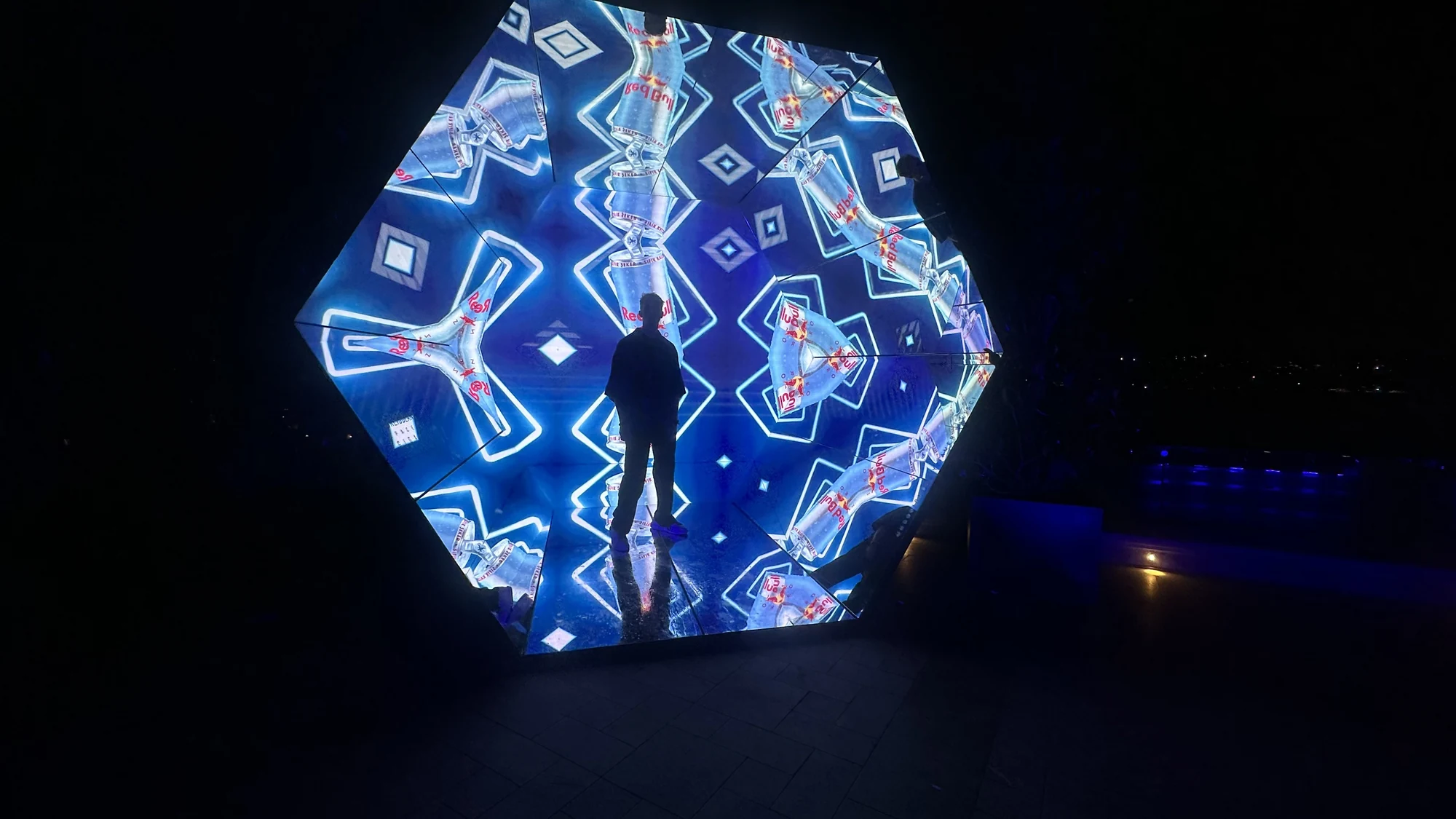 A visitor on the raised floor inside Red Bull projections at Mandarin Oriental