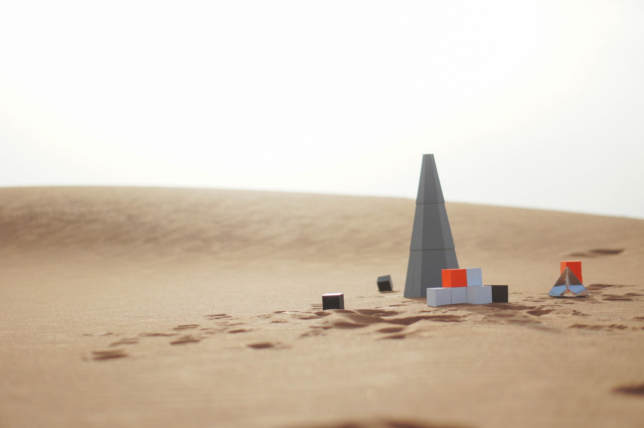 Geometric sculptural forms in the Sharjah desert, photographed by Tamer Nakışçı