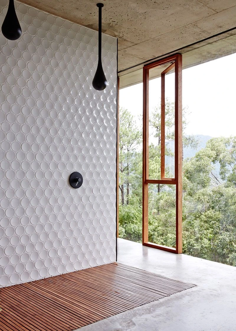 Another view of the Dot tiled shower and open rainforest window
